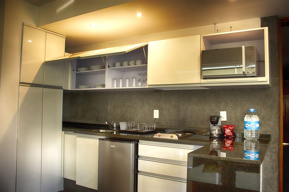 Mini-fridge, microwave, coffee/tea maker, electric kettle