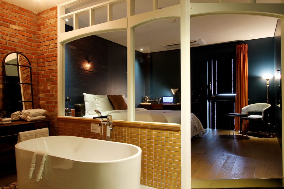 Superior Double Room (Bathtub or shower depend on room type) | Egyptian cotton sheets, down comforters, memory foam beds, free minibar