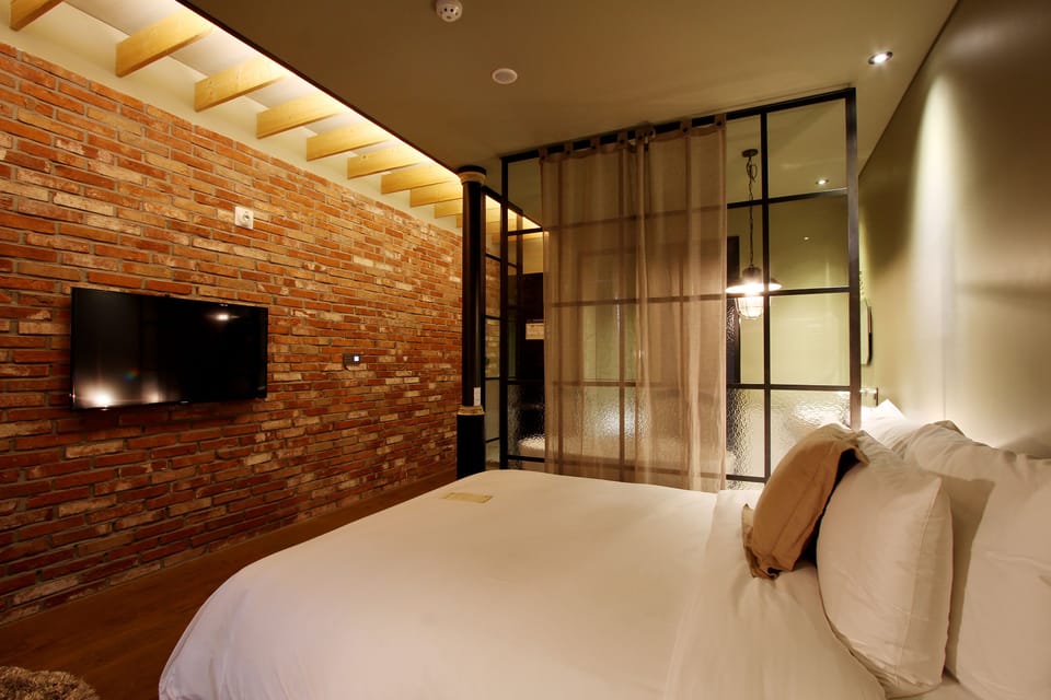 Superior Double Room (Bathtub or shower depend on room type) | Egyptian cotton sheets, down comforters, memory foam beds, free minibar