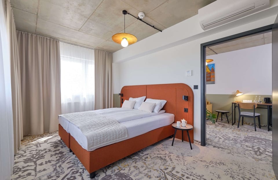 Suite | Individually decorated, desk, laptop workspace, soundproofing