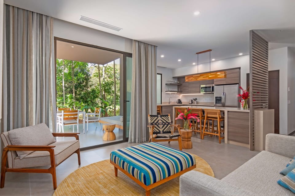 Suite, 3 Bedrooms | Living area | 55-inch LCD TV with cable channels, TV