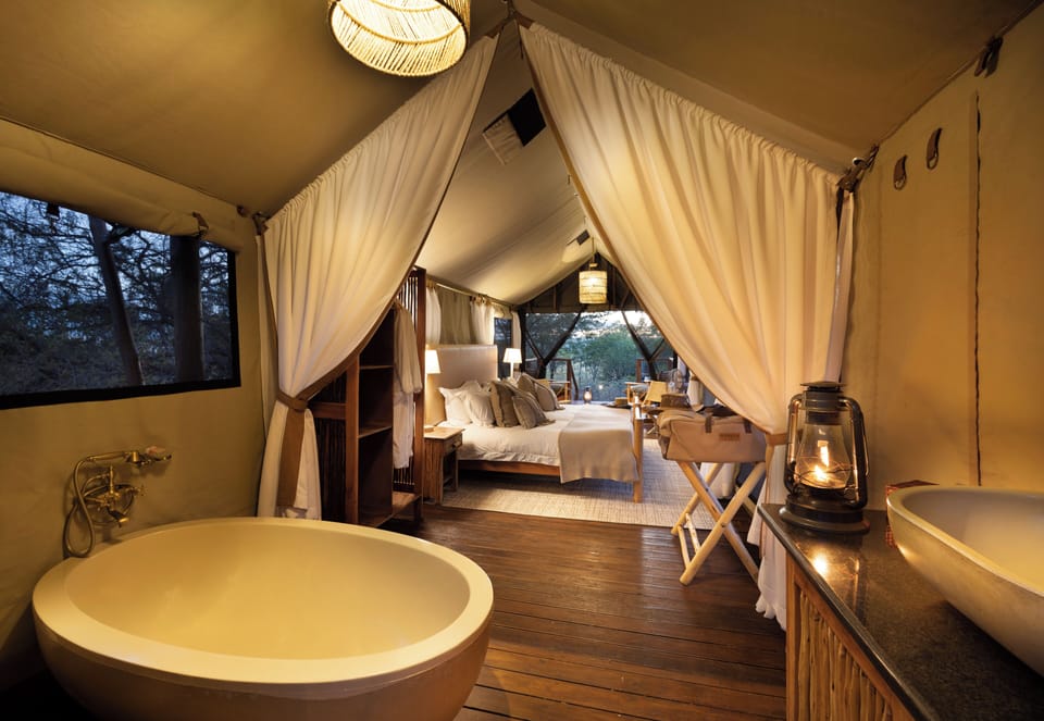Tent | Bathroom | Bathtub, designer toiletries, hair dryer, towels