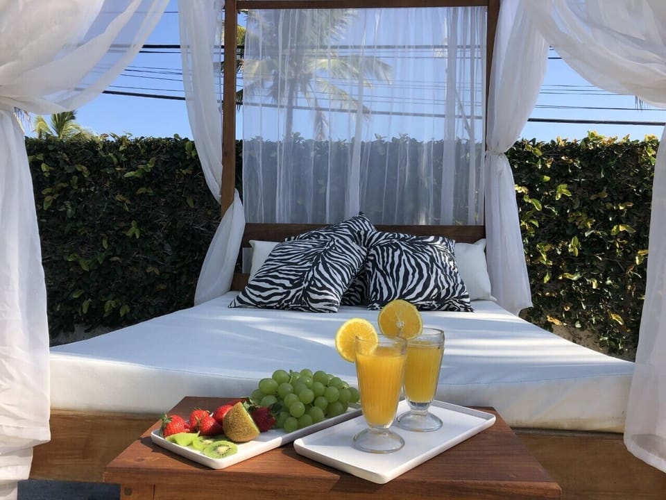 Outdoor pool, open 7:00 AM to 10:30 PM, pool umbrellas, sun loungers