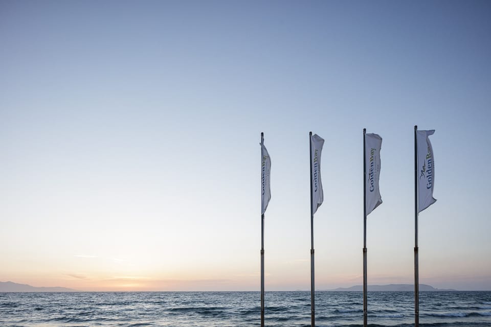 On the beach, sun loungers, beach umbrellas