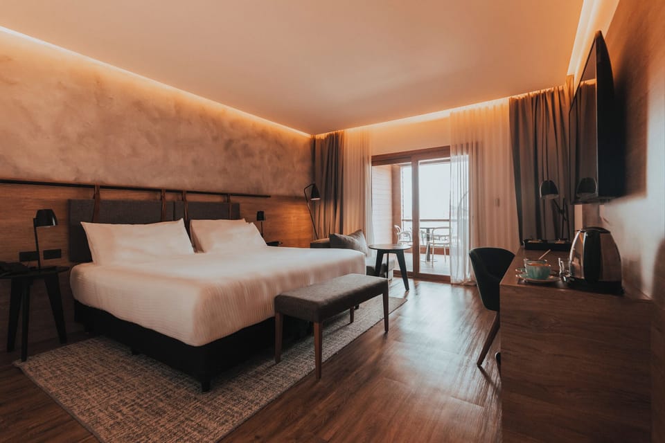 Junior Suite, Mountain View | Minibar, in-room safe, individually decorated, individually furnished