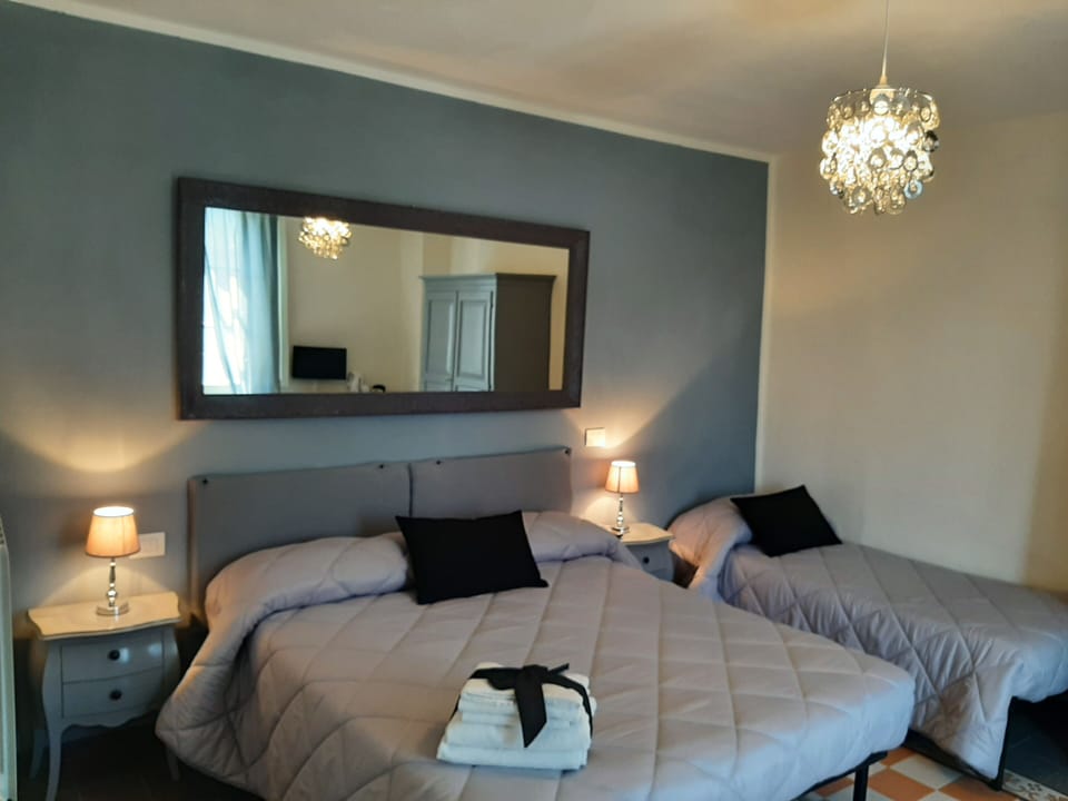 Family Room | In-room safe, desk, blackout drapes, iron/ironing board