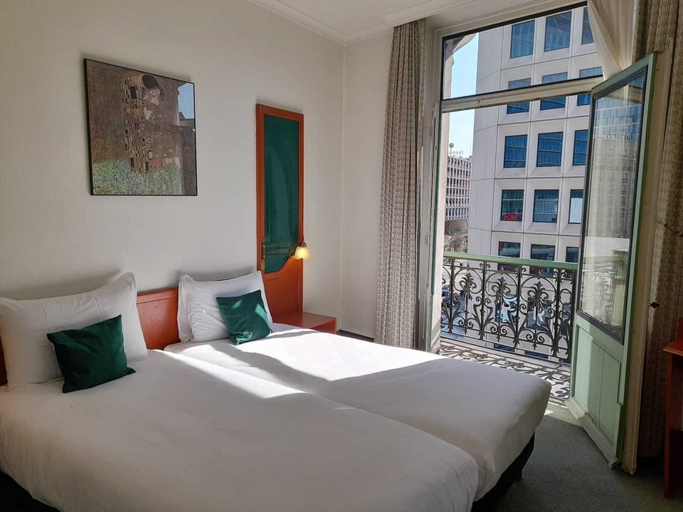 Twin Room | Minibar, desk, blackout drapes, free WiFi