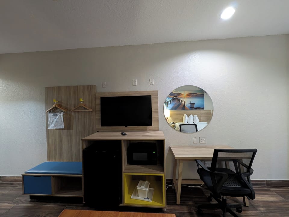 Suite, 1 Queen Bed, Non Smoking | Individually decorated, individually furnished, desk, laptop workspace