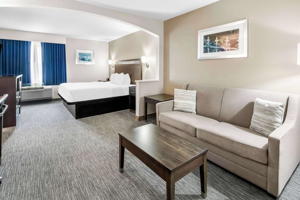 Suite, 1 King Bed, Non Smoking, Refrigerator & Microwave | Pillowtop beds, desk, laptop workspace, iron/ironing board