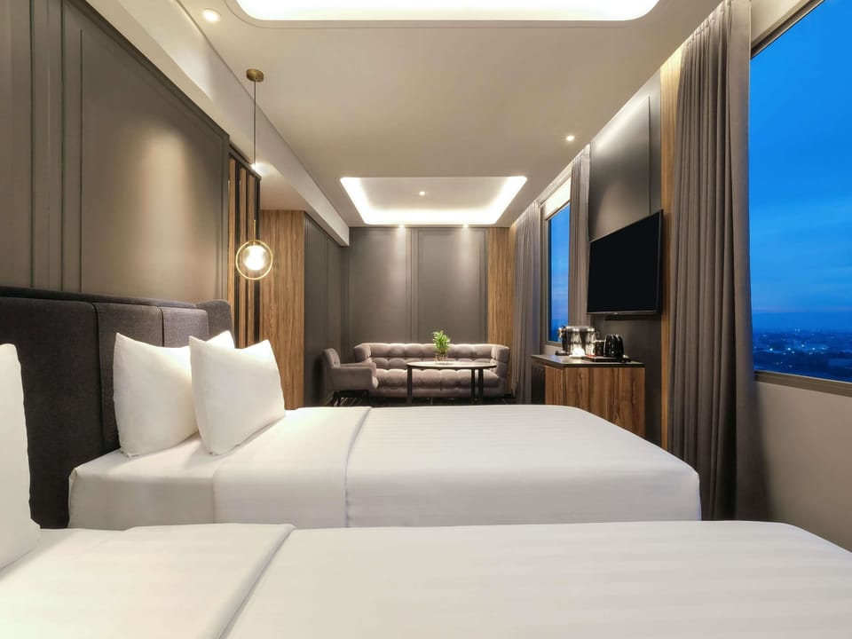 Junior Suite, 2 Twin Beds | Premium bedding, minibar, desk, laptop workspace