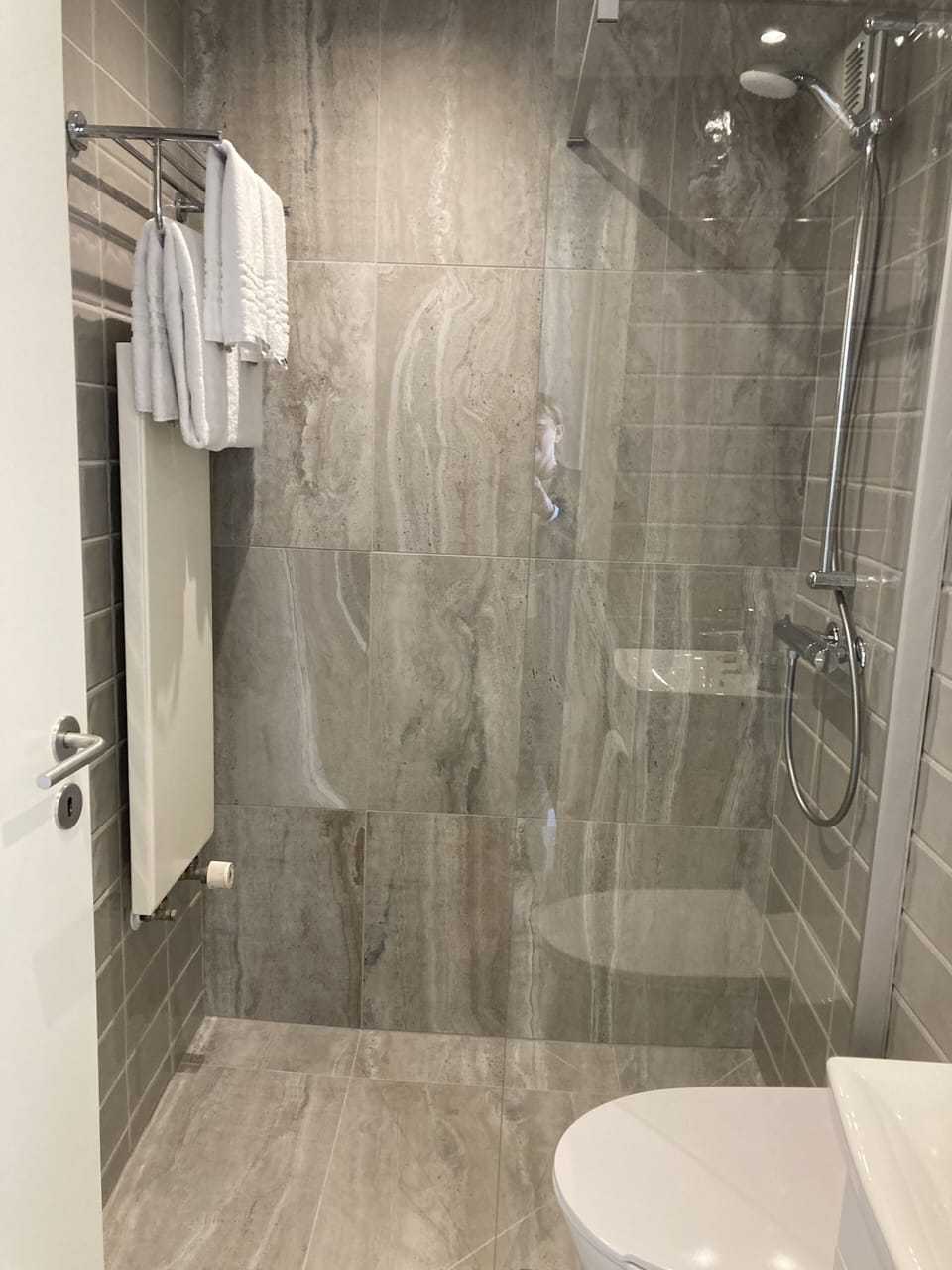 Shower, eco-friendly toiletries, hair dryer, towels