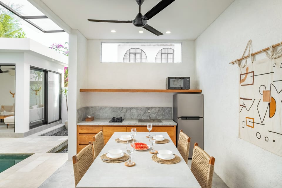 Villa | Private kitchen | Fridge, microwave, stovetop, cookware/dishes/utensils