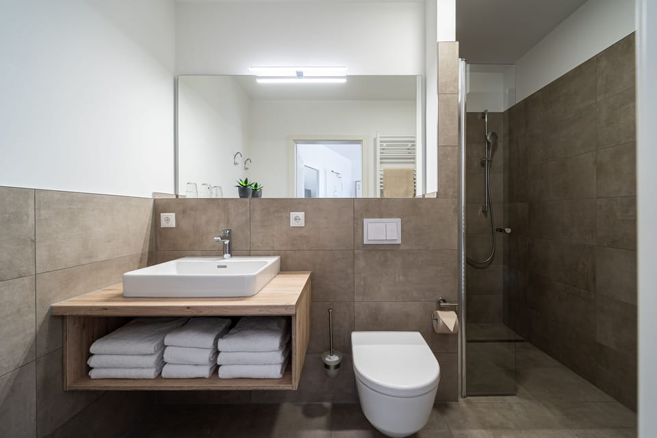 Apartment, 1 Bedroom, Balcony | Bathroom | Shower, hair dryer, towels