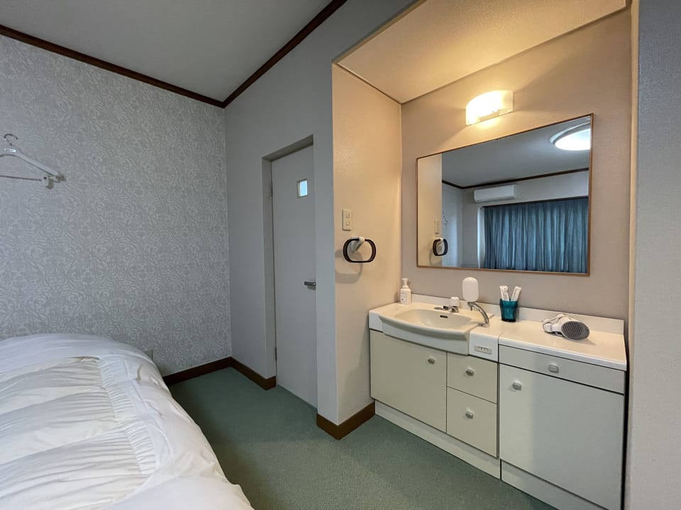 Superior Twin Room | Bathroom | Separate tub and shower, spring water tub, towels
