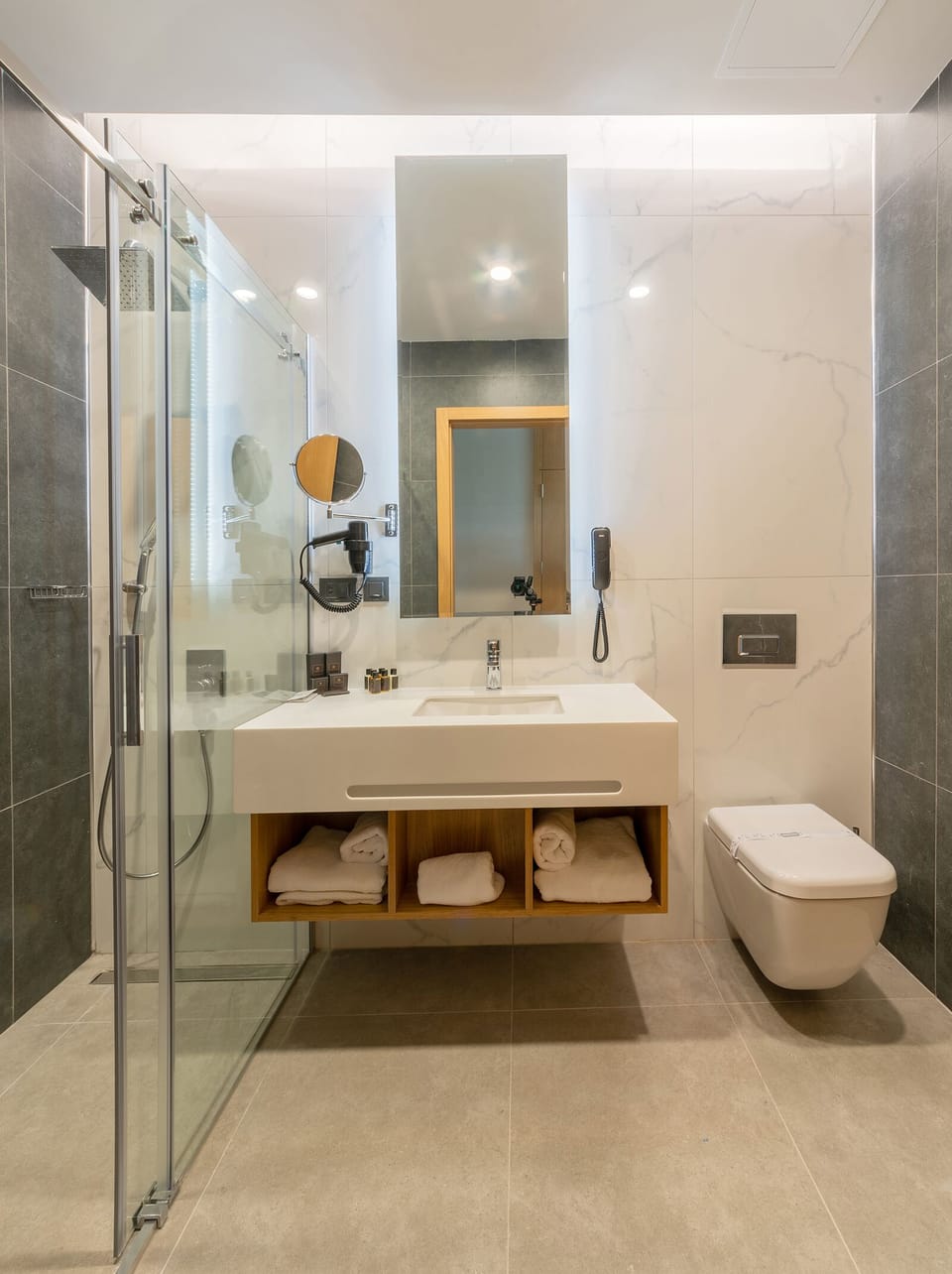 Shower, rainfall showerhead, towels