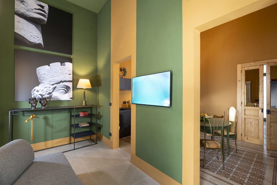 Deluxe Apartment | Living area | Flat-screen TV
