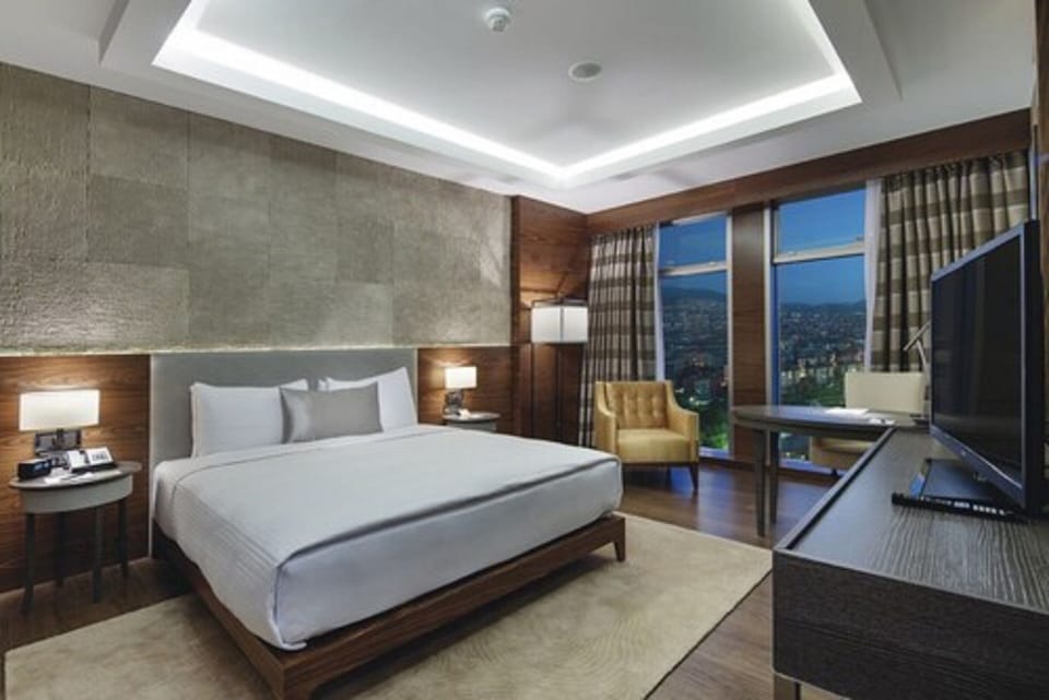 Down comforters, free minibar items, in-room safe, desk