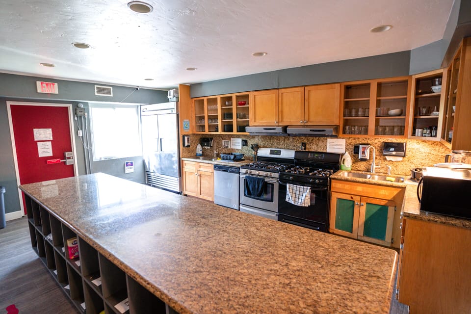 Deluxe Double Room, 1 Queen Bed, Corner | Shared kitchen | Full-size fridge, microwave, oven, stovetop
