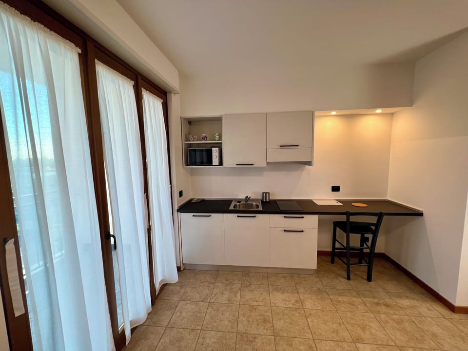 Standard Suite | Private kitchen | Shared fridge, microwave
