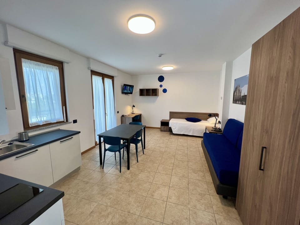 Standard Studio | Premium bedding, down comforters, pillowtop beds, desk