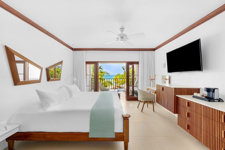 Beachfront Verandah Suite | Premium bedding, minibar (free items), in-room safe, desk
