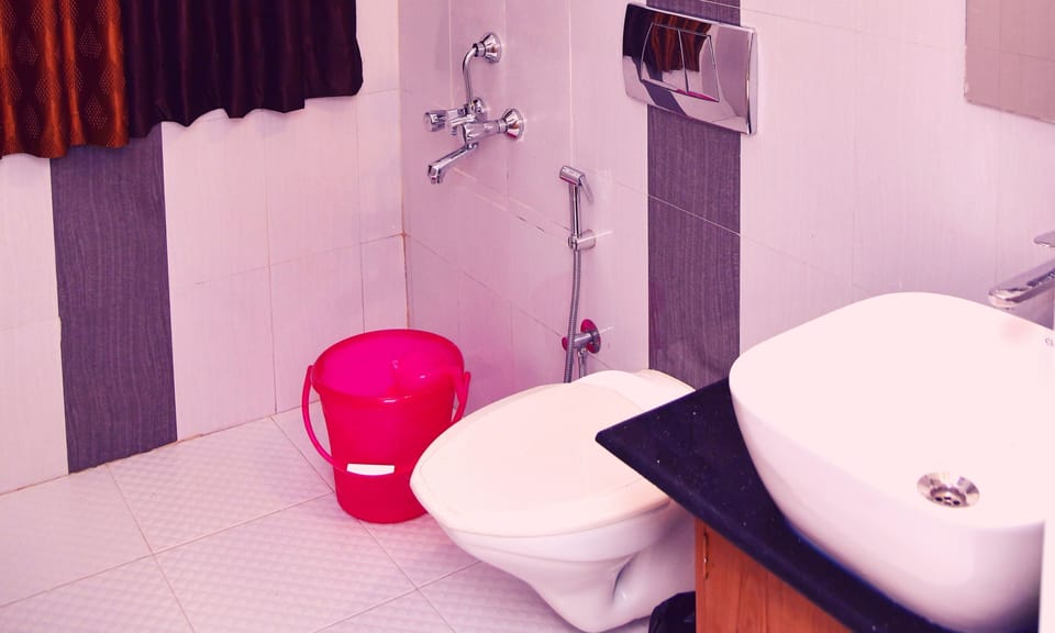Shower, free toiletries, slippers, towels