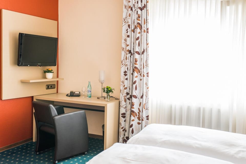 Desk, blackout drapes, soundproofing, free cribs/infant beds