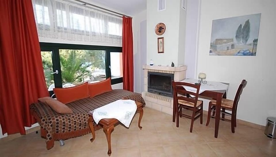 Villa | Living area | 22-inch LCD TV with satellite channels, TV