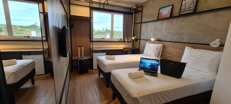 Standard Room, 2 Twin Beds | Minibar, in-room safe, iron/ironing board, bed sheets