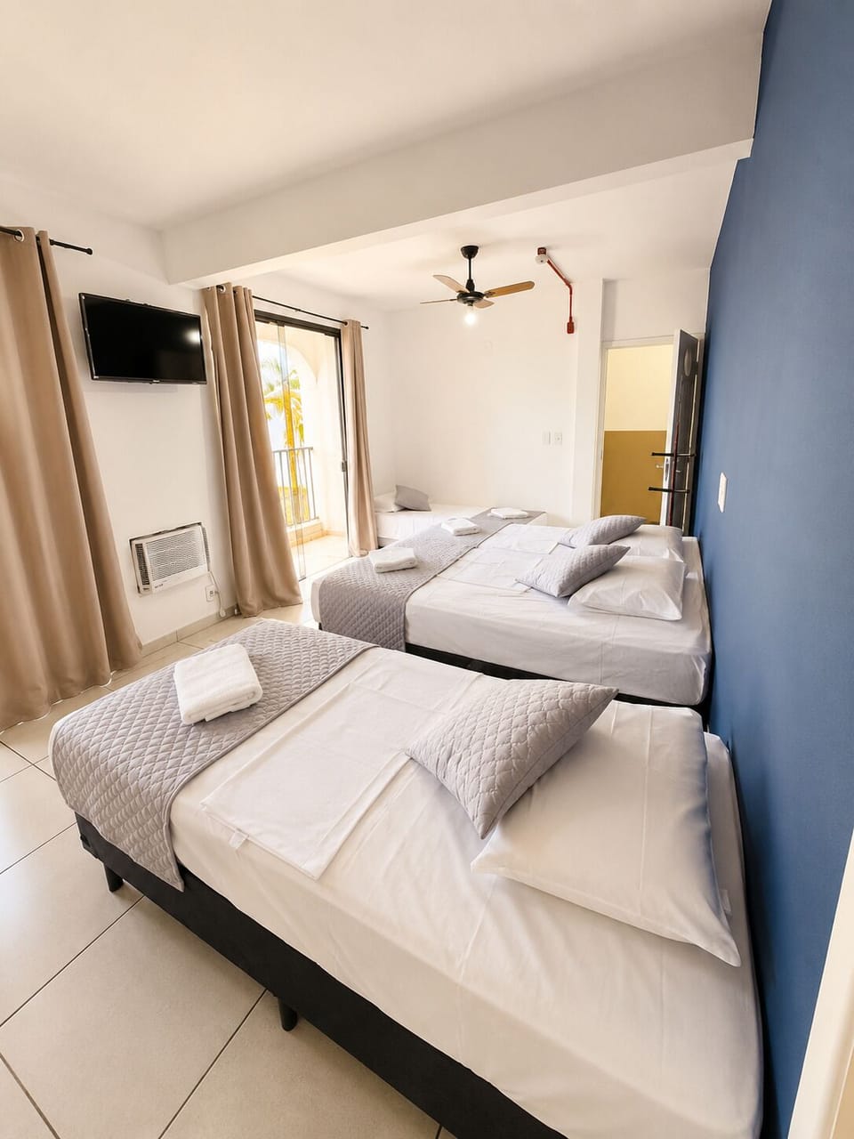Traditional Quadruple Room | Hypo-allergenic bedding available, WiFi (free), bed sheets