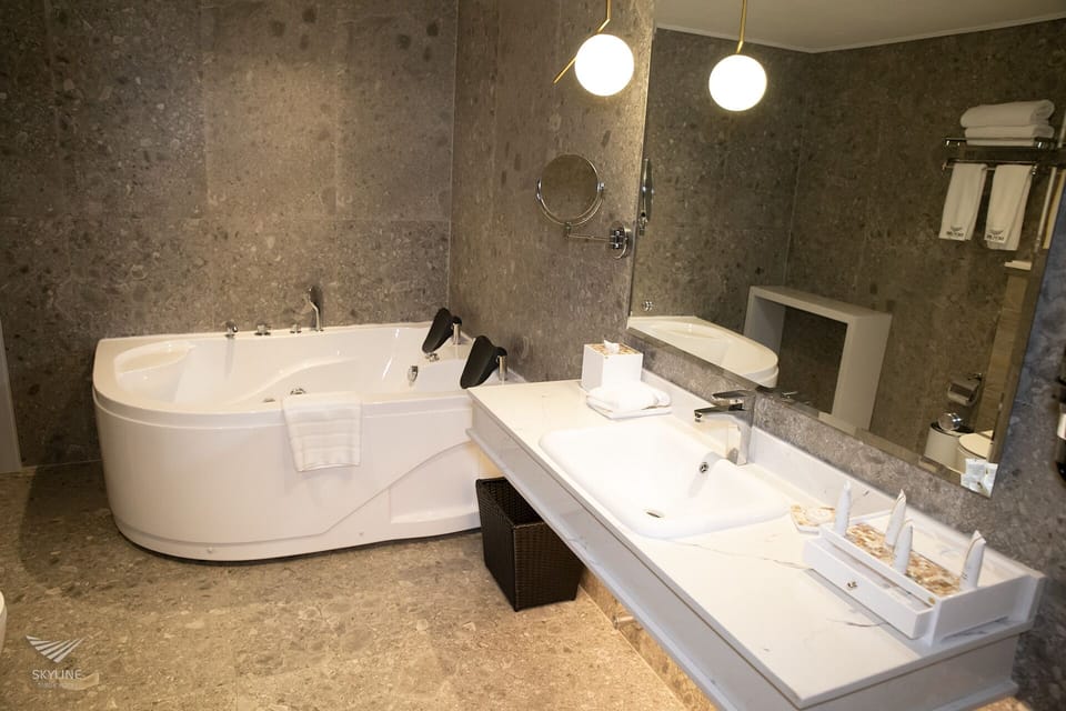 Superior Room | Bathroom | Bathtub, free toiletries, hair dryer, bathrobes