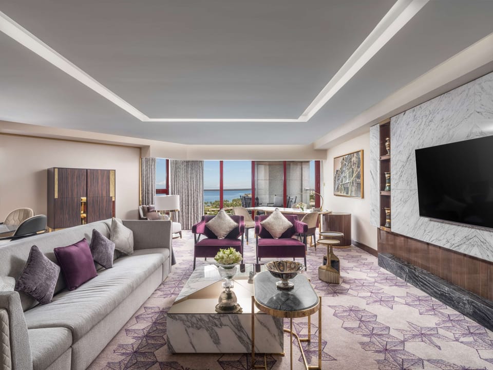Premium Suite, 1 King Bed (Amiri Suite) | Living area | 37-inch LED TV with cable channels, TV, DVD player