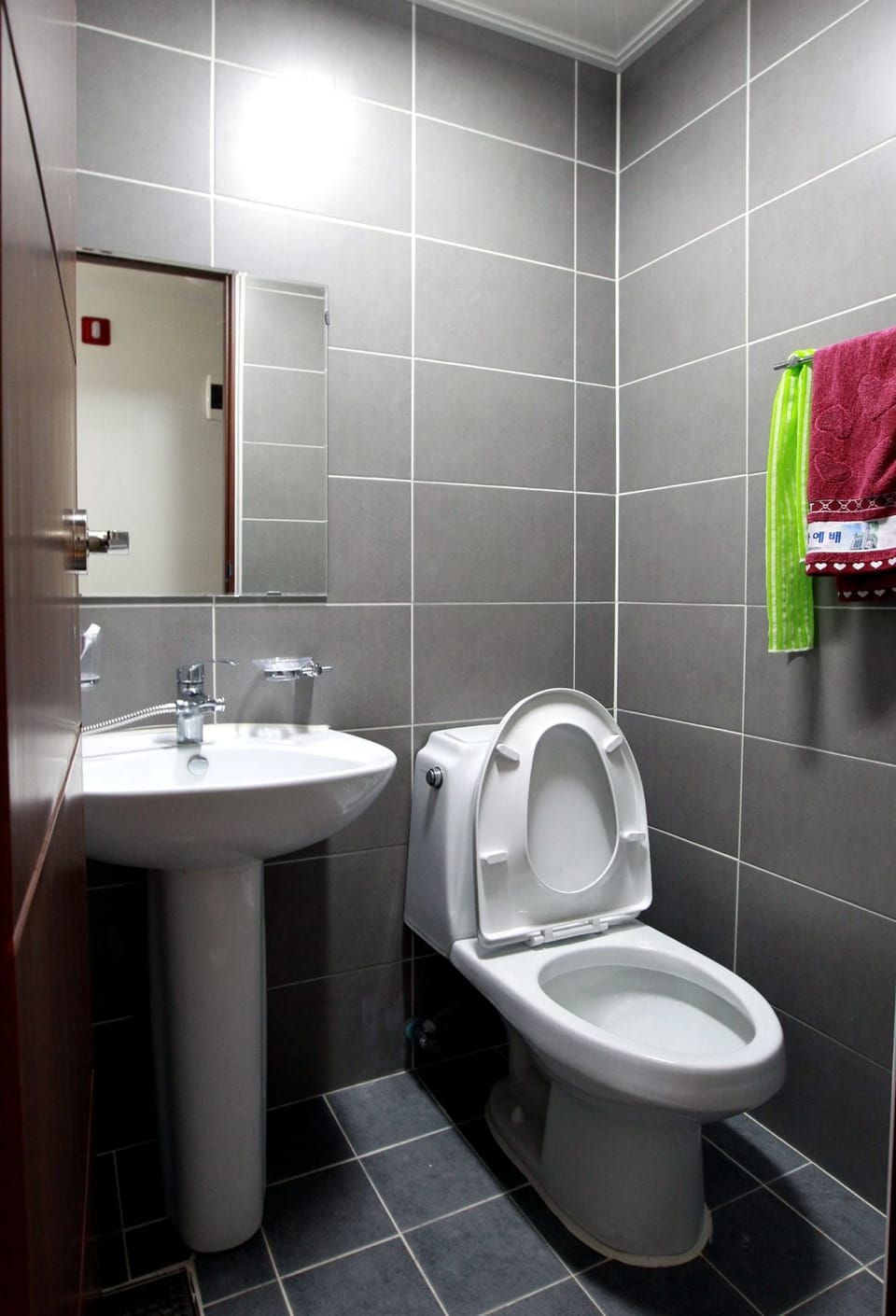 Shower, free toiletries, hair dryer, slippers