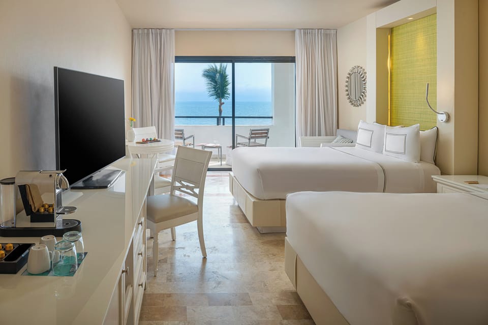 Premium Ocean Front | Minibar (free items), in-room safe, blackout drapes, iron/ironing board