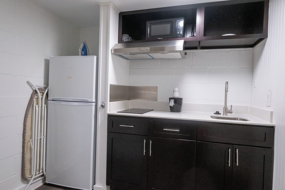 Fridge, microwave, coffee/tea maker, coffee grinder