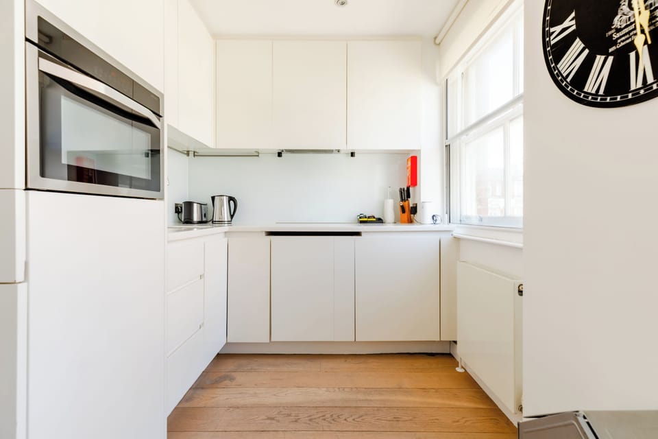 Design Apartment | Private kitchen | Full-size fridge, microwave, oven, stovetop