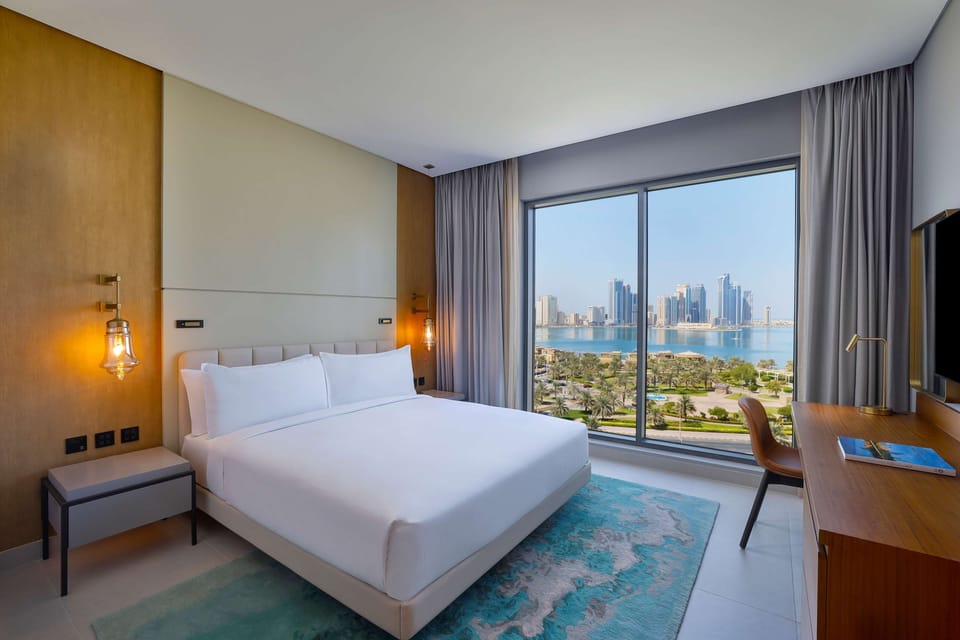 Premium bedding, down comforters, memory foam beds, minibar