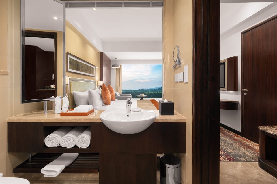 Designer toiletries, hair dryer, bathrobes, slippers