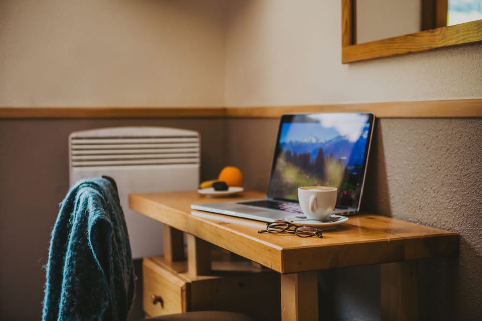 Desk, laptop workspace, blackout drapes, iron/ironing board (on request)