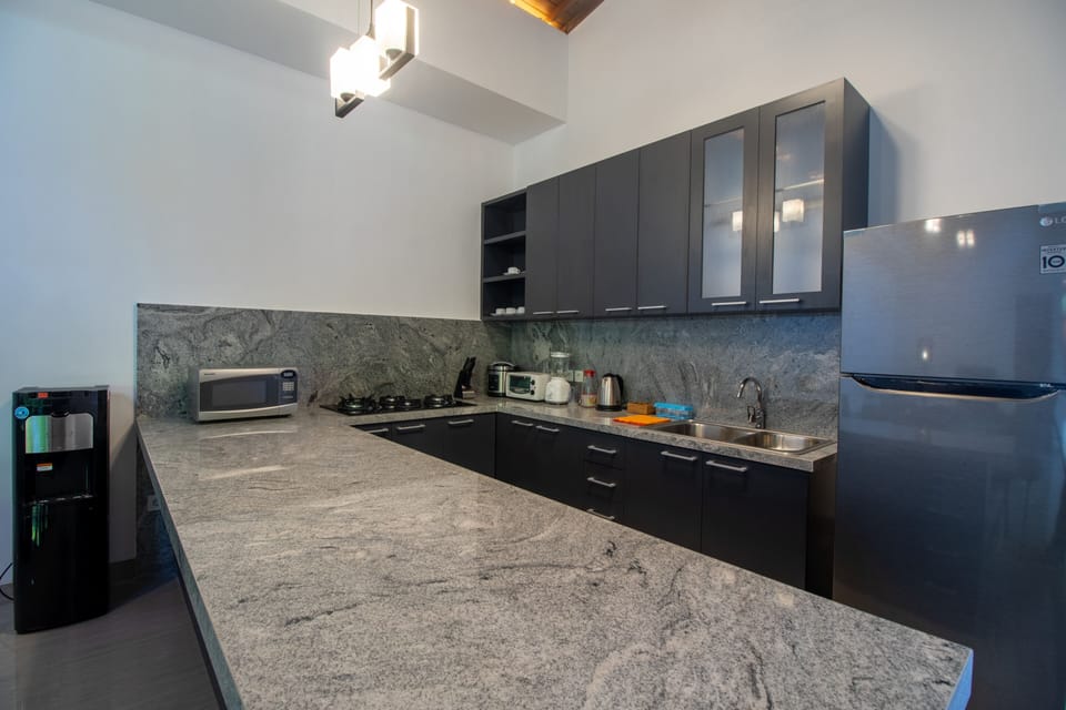Villa | Private kitchen | Electric kettle, paper towels