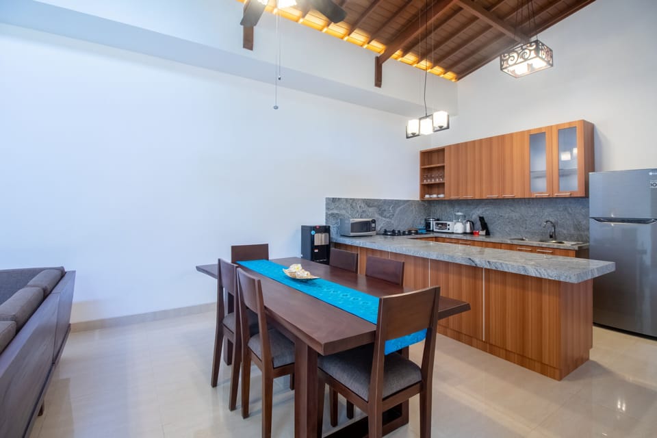 Exclusive Villa | Private kitchen | Fridge, stovetop, electric kettle, toaster