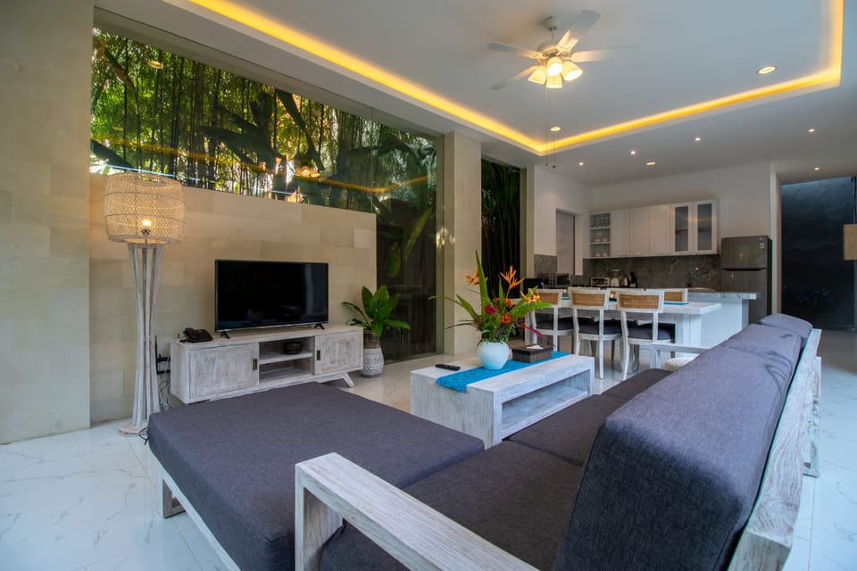 Villa | Living area | 42-inch LED TV with cable channels, TV