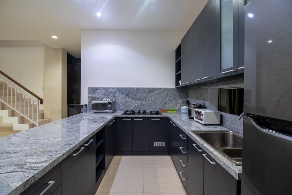 Villa | Private kitchen | Fridge, microwave, stovetop, electric kettle
