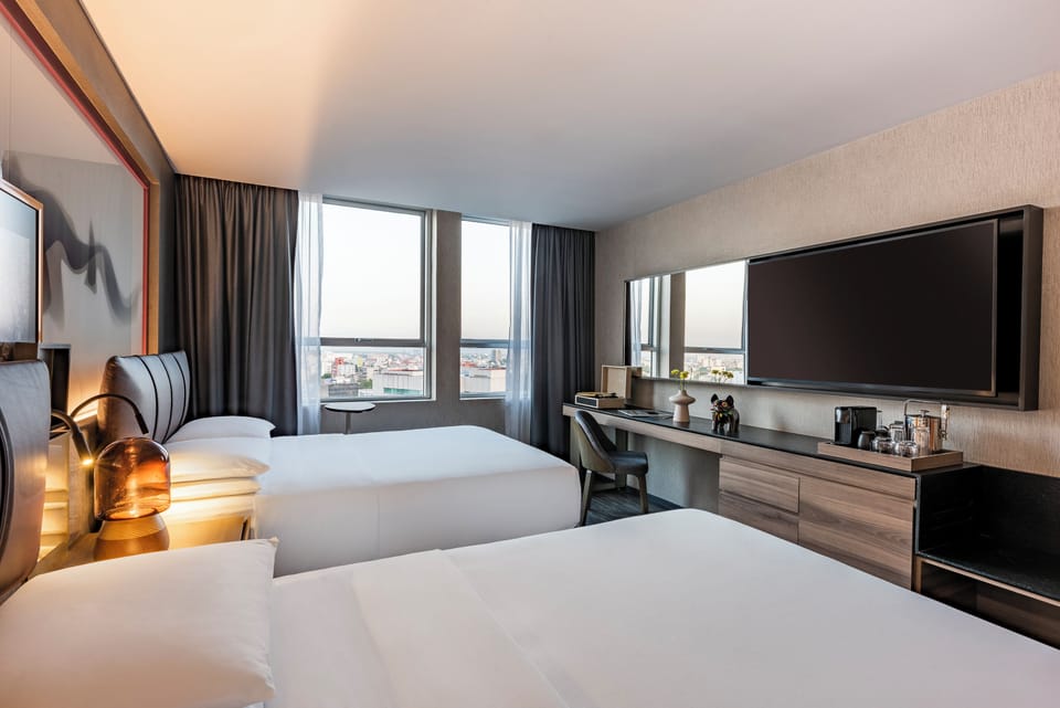 Hypo-allergenic bedding, down comforters, free minibar items