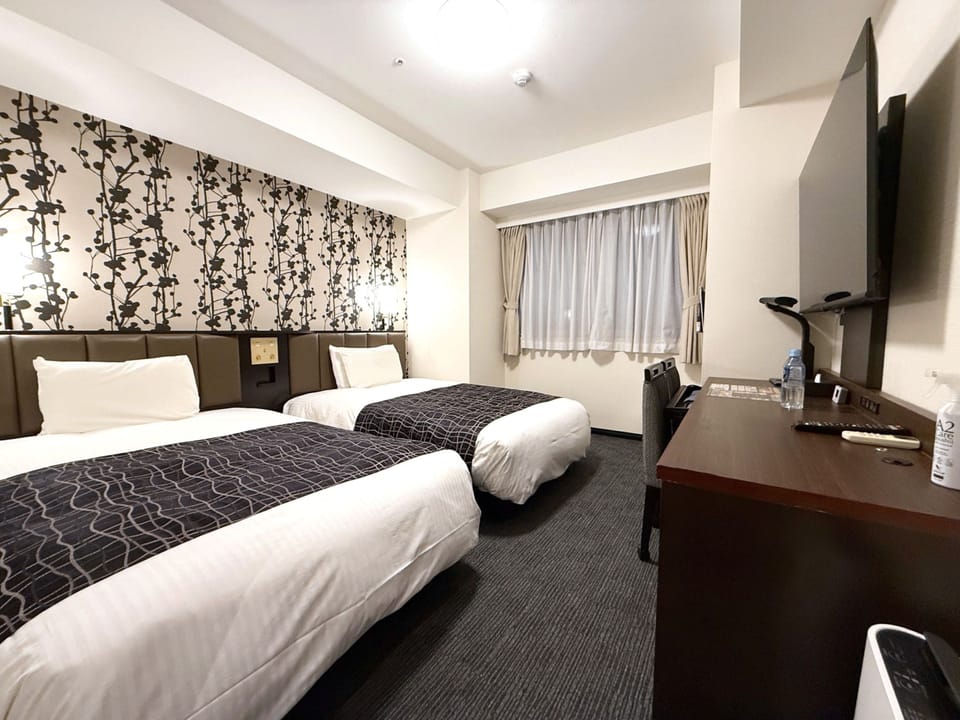 Twin Room, Non Smoking | Desk, blackout drapes, iron/ironing board, free WiFi