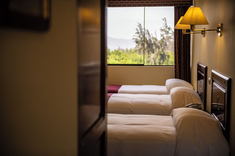 Triple Room | Premium bedding, minibar, in-room safe, desk