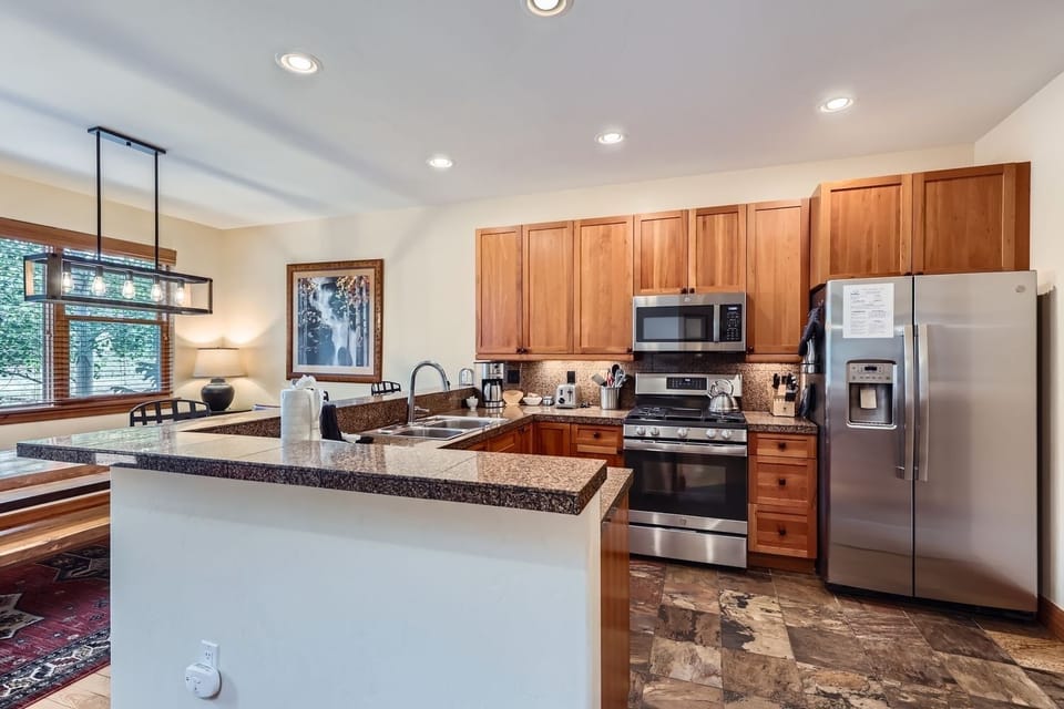 Townhome, 4 Bedrooms | Private kitchen | Coffee/tea maker, fridge, oven, toaster