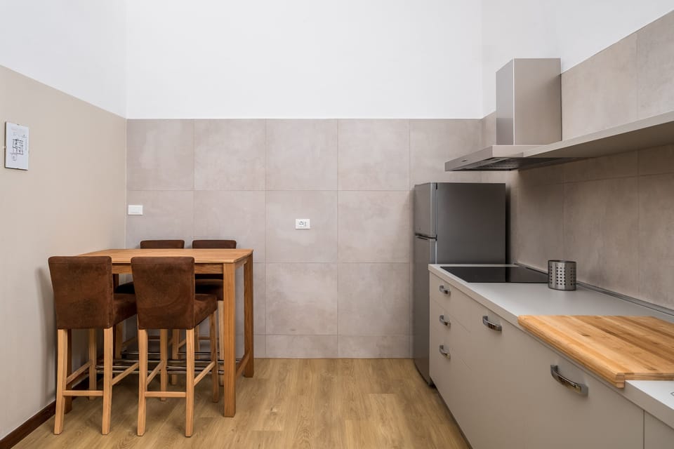 Apartment | Private kitchen | Full-size fridge, stovetop, dishwasher, electric kettle