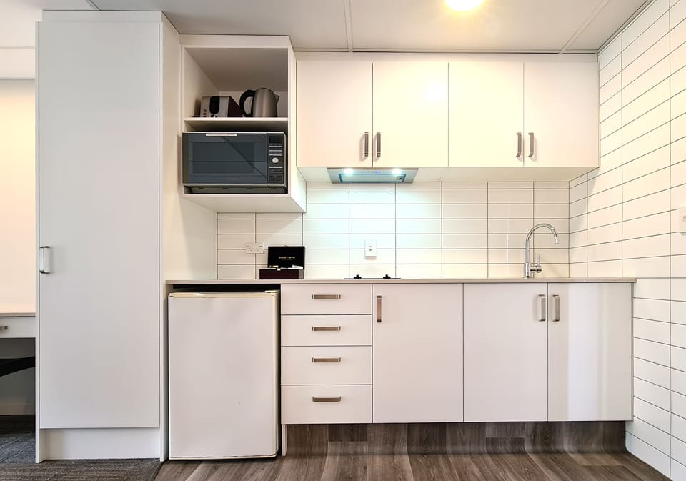 Coffee/tea maker, mini-fridge, electric kettle, toaster