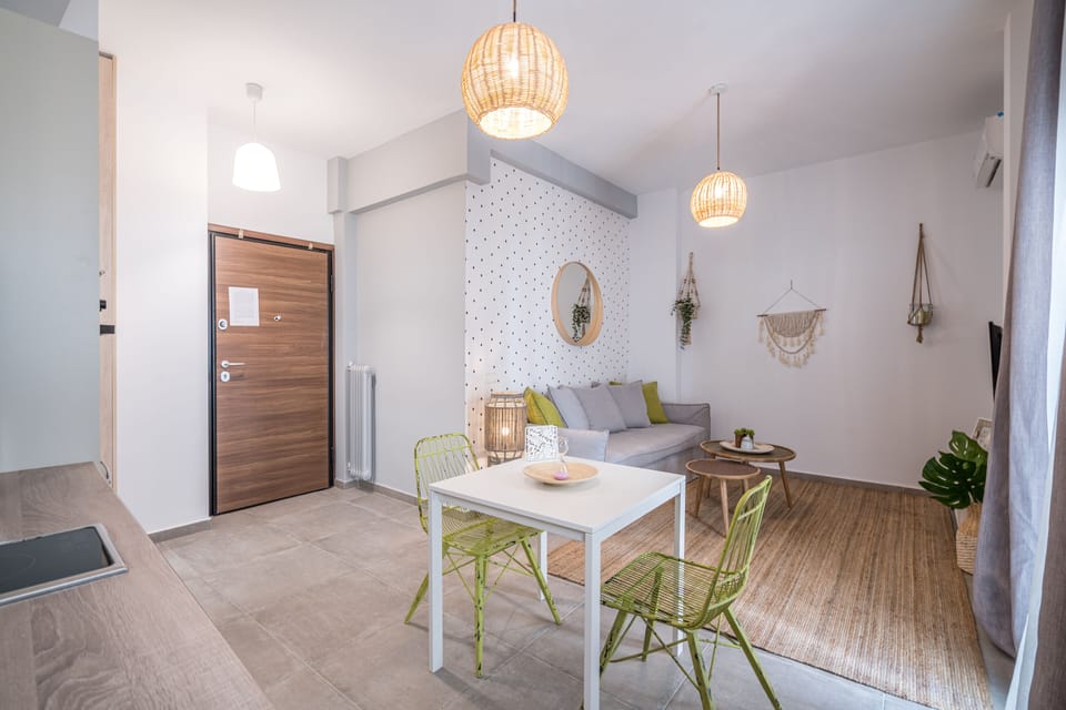 Superior Apartment | Living area | 43-inch flat-screen TV with cable channels